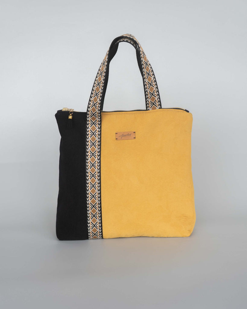 sac en tissu noir et jaune avec anses motif ethnique